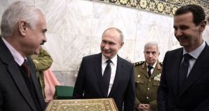 assad haftar putin