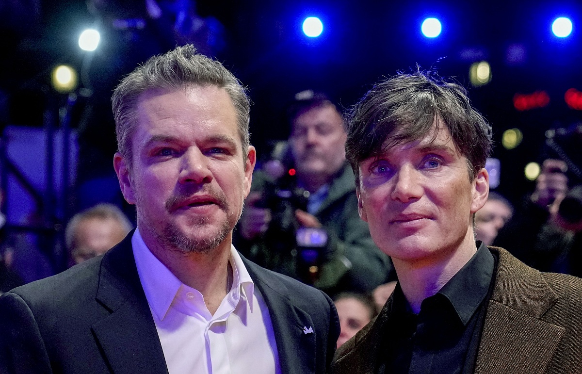 actor cilian murphy right and producer matt damon stand on the red carpet outside the berlinale palast