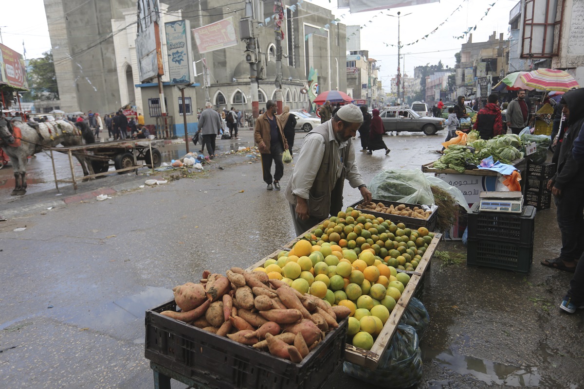 palestinian buys vegetables in rafah gaza strip during ongoing israeli bombardmen